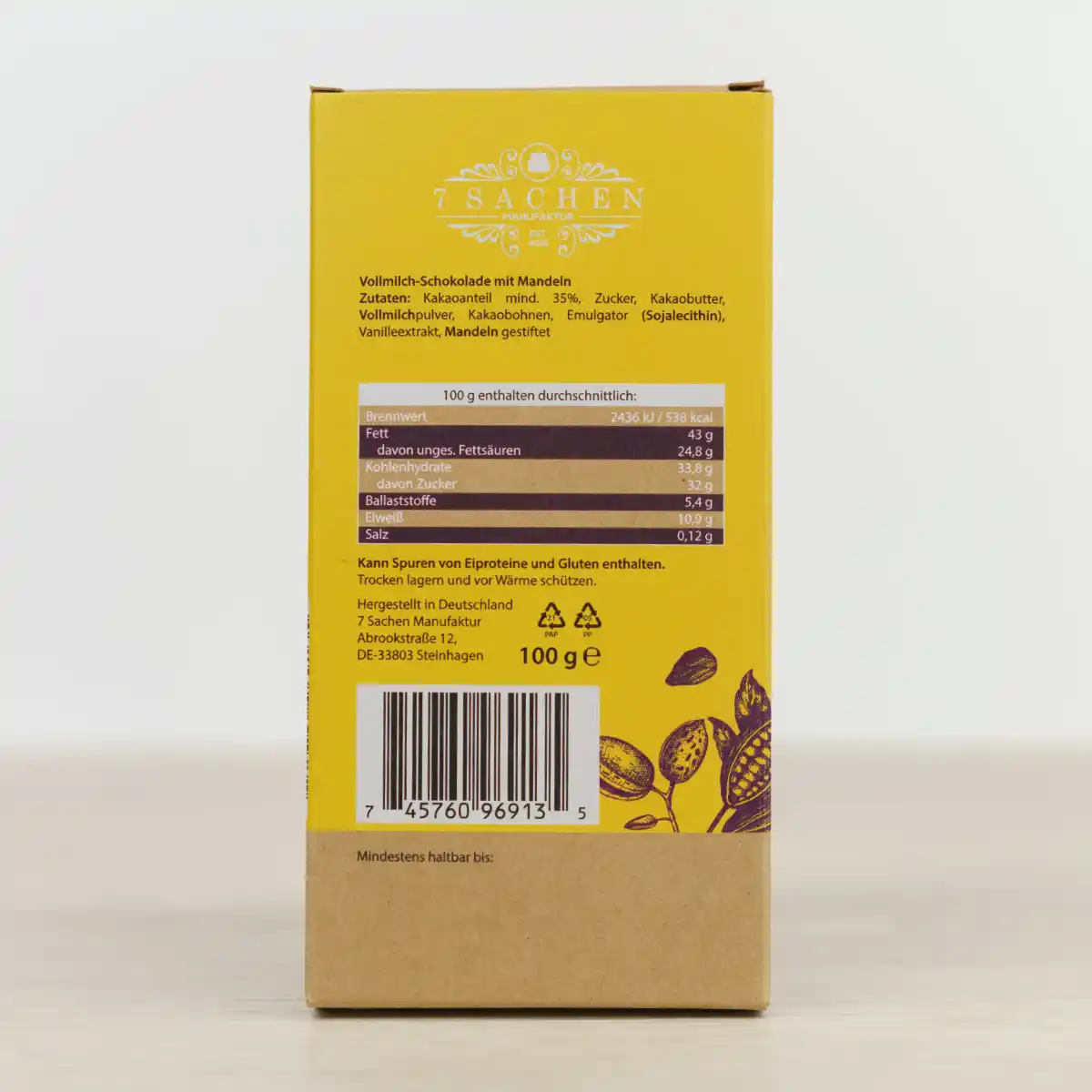 Handgegossene Vollmilchschokolade mit Mandeln aus Valrhona-Couverture – cremig & edel, von der 7 Sachen Manufaktur. Rückseite