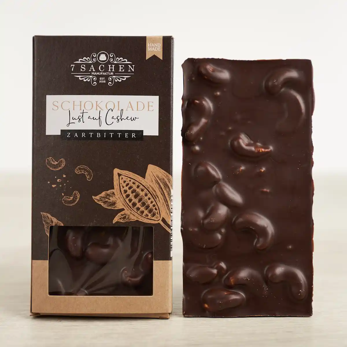 Handgegossene Zartbitterschokolade 55 % mit Cashew – cremig & fein nussig aus Steinhagen.