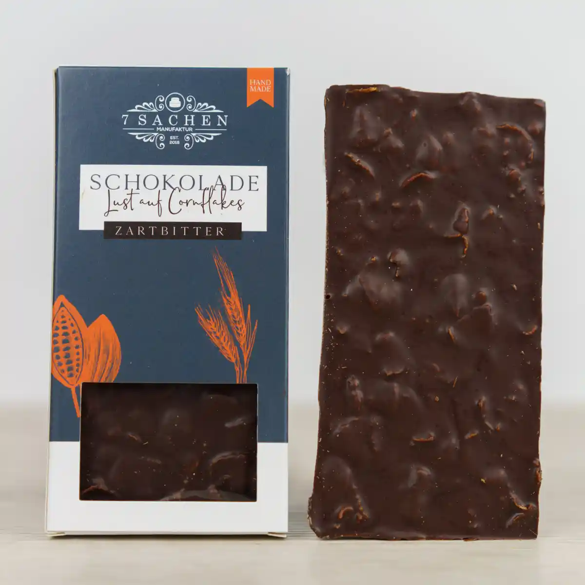 Handgegossene Zartbitterschokolade 55 % mit Cornflakes – knusprig & zartbitter aus Steinhagen.