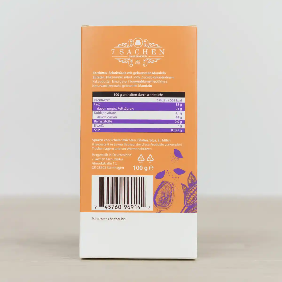 Handgegossene Zartbitterschokolade 55 % mit gebrannten Mandeln – knusprig & golden geröstet aus Steinhagen. Rückseite
