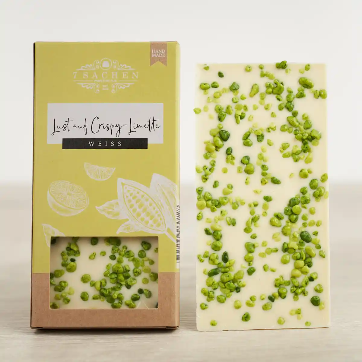 Handgegossene weiße Schokolade mit Knusper-Limette & Knallbrause – spritzig & überraschend aus Steinhagen.