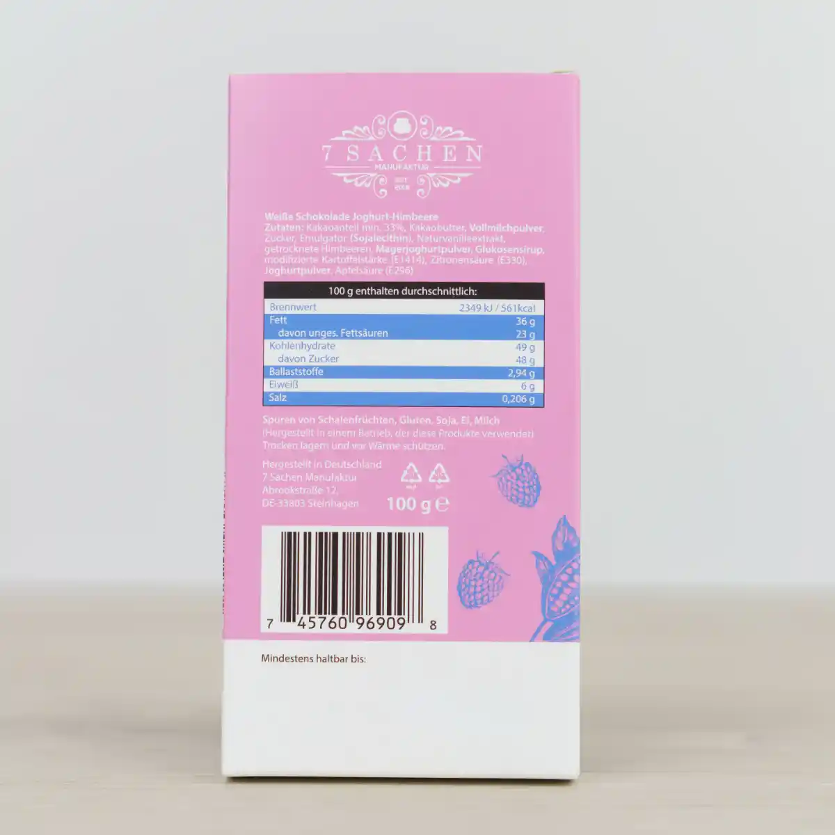 Handgegossene weiße Schokolade mit Himbeeren & Joghurt – fruchtig & cremig aus Steinhagen. Rückseite