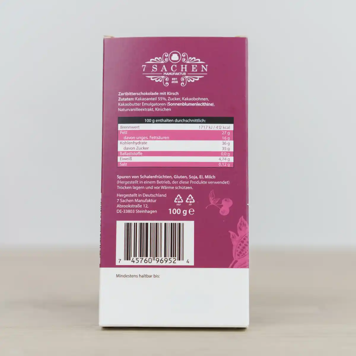 Handgegossene Zartbitterschokolade 55 % mit Kirschen – fruchtig & vollmundig aus Steinhagen. Rückseite