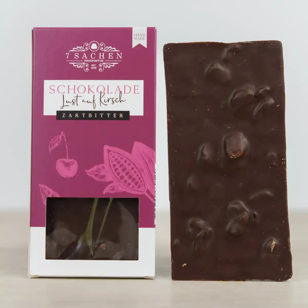 Handgegossene Zartbitterschokolade 55 % mit Kirschen – fruchtig & vollmundig aus Steinhagen.