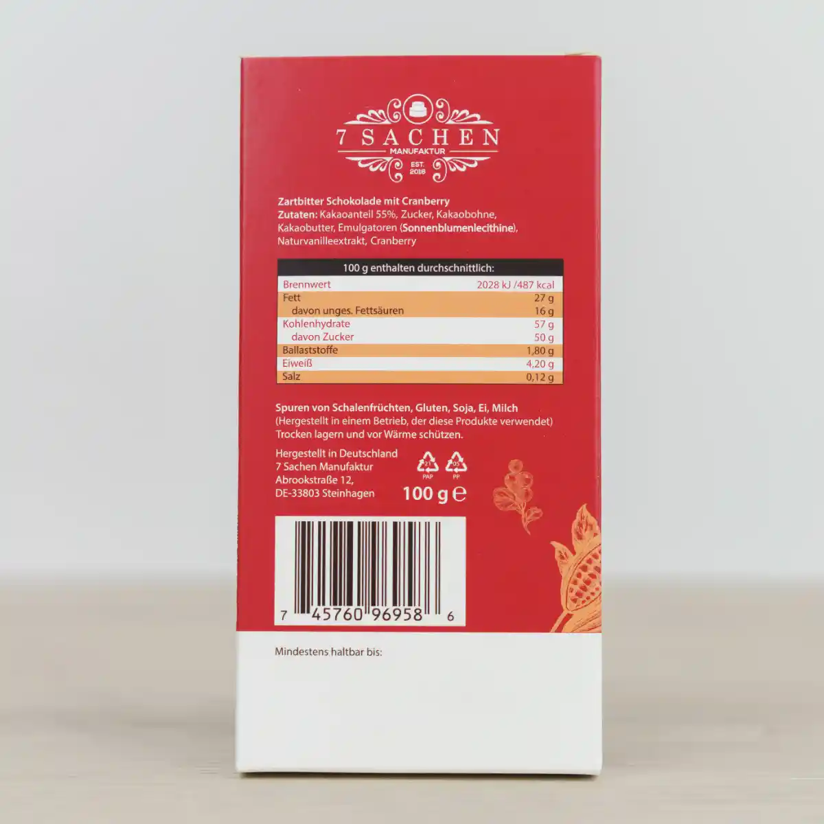 Handgegossene Zartbitterschokolade 55 % mit Cranberry – fruchtig & edel aus Steinhagen. Rückseite