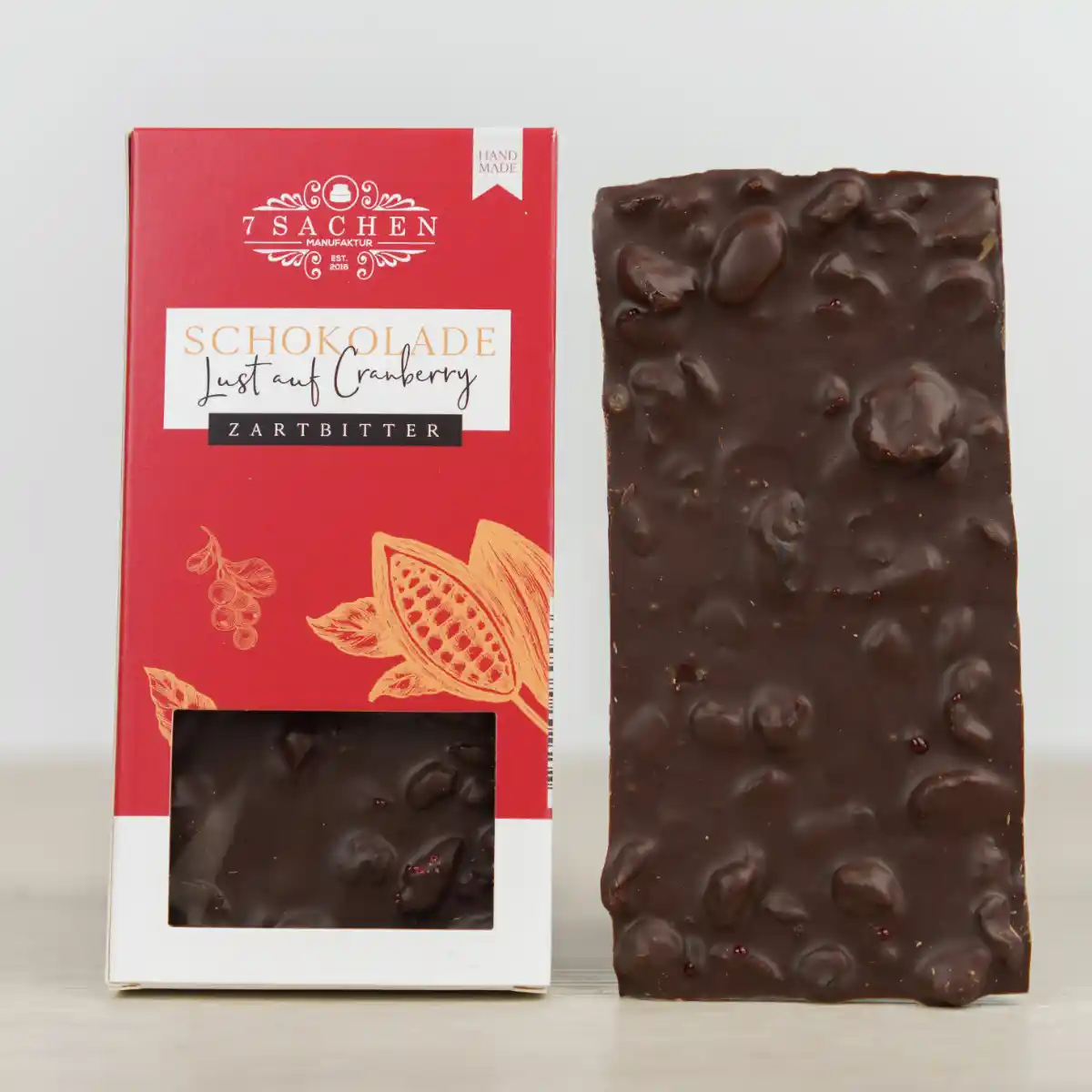 Handgegossene Zartbitterschokolade 55 % mit Cranberry – fruchtig & edel aus Steinhagen.