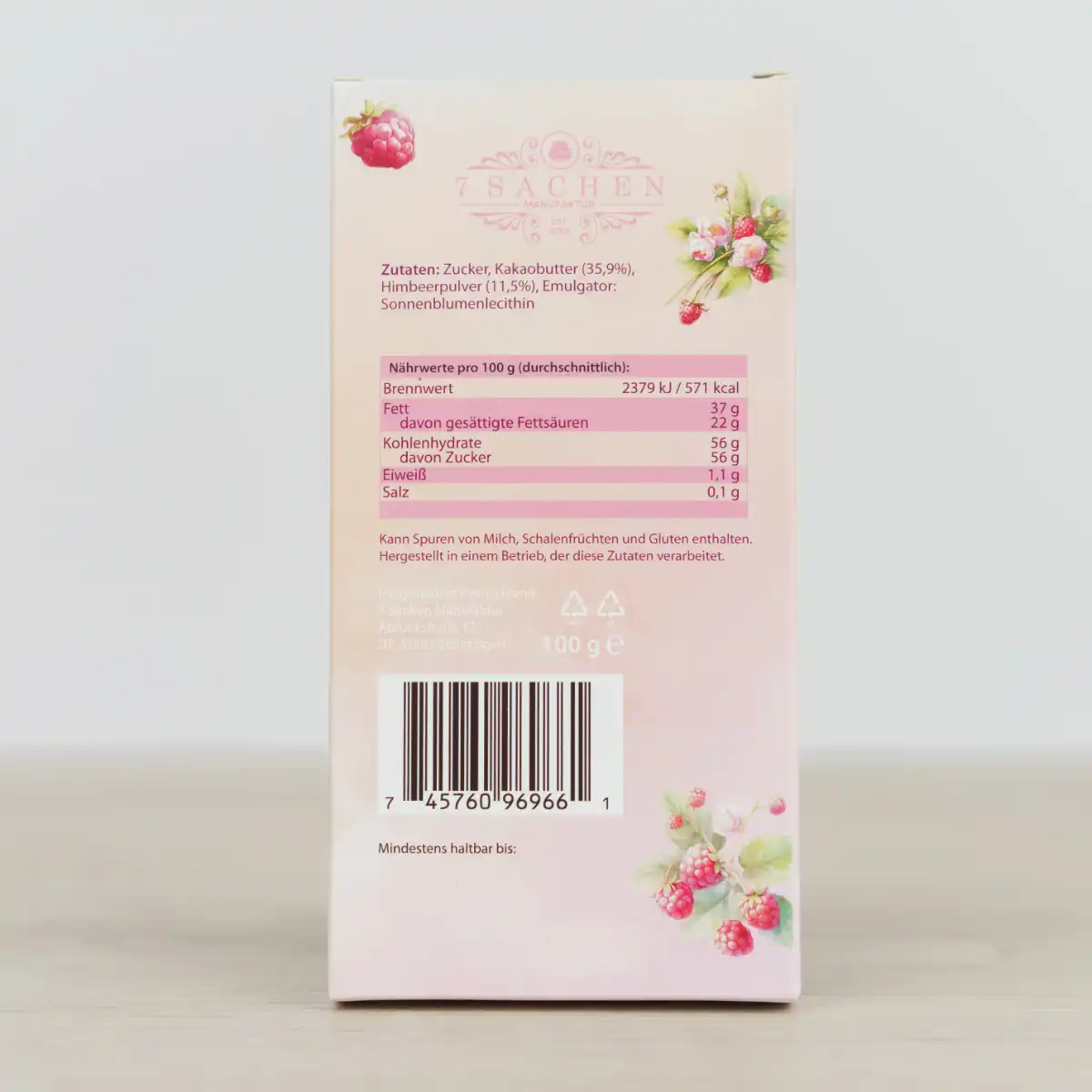 Handgegossene Himbeerschokolade aus Valrhona Fruchtkuvertüre – intensiv fruchtig & zart schmelzend, vegan und handgefertigt in Steinhagen. Rückseite