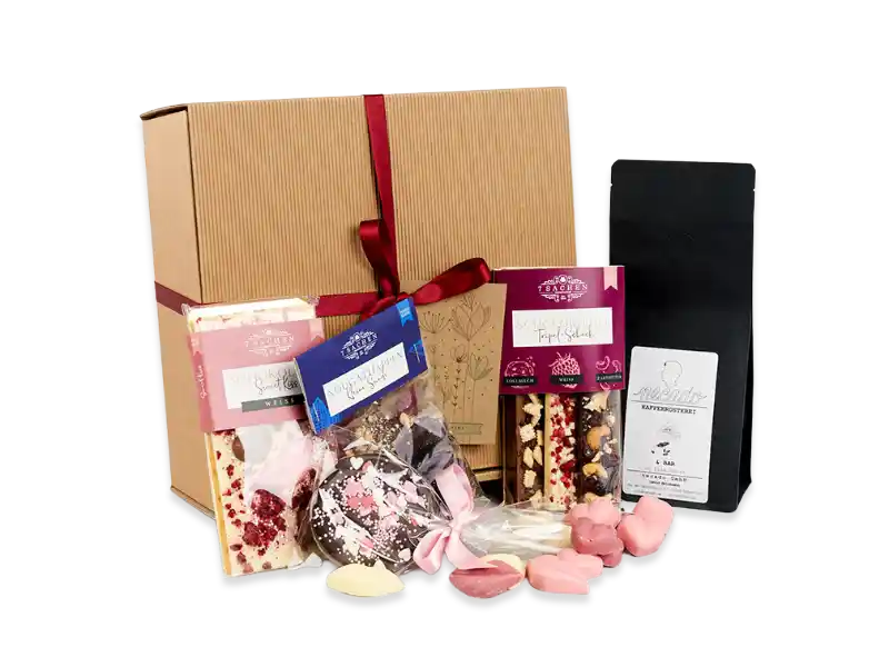 Geschenkbox „Lust auf Schokolade“ von 7 Sachen Manufaktur mit Schokoladentafeln, Bruchschokolade, Lollis, Pralinen und Kaffee, dekorativ verpackt.