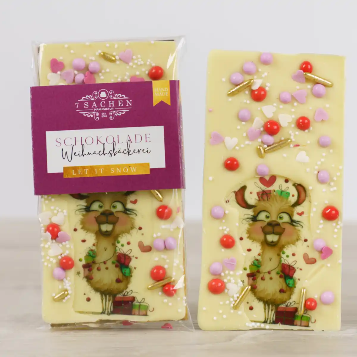 Handgegossene weiße Weihnachtsschokolade mit Motiv Alpaka aus der 7 Sachen Manufaktur