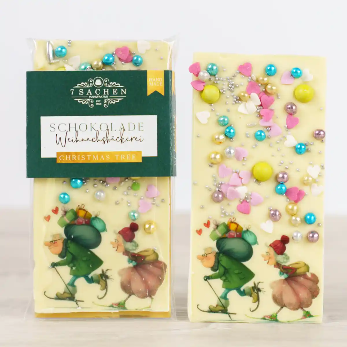 Handgegossene weiße Weihnachtsschokolade mit Motiv Großeltern aus der 7 Sachen Manufaktur