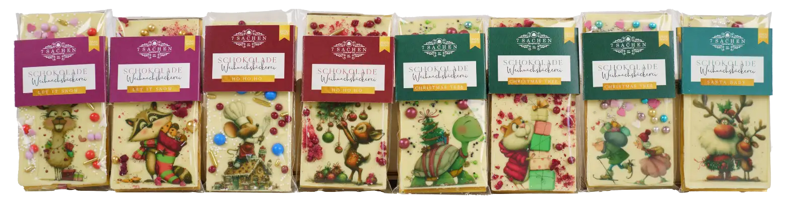 Handgegossene Weihnachtsschokoladen mit winterlichen Motiven aus Valrhona-Schokolade, gefertigt in der 7 Sachen Manufaktur in Steinhagen